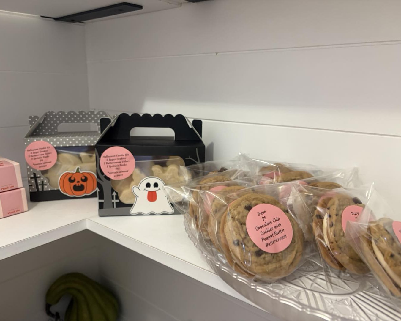 Bake stand shelves stocked with cookies and treats