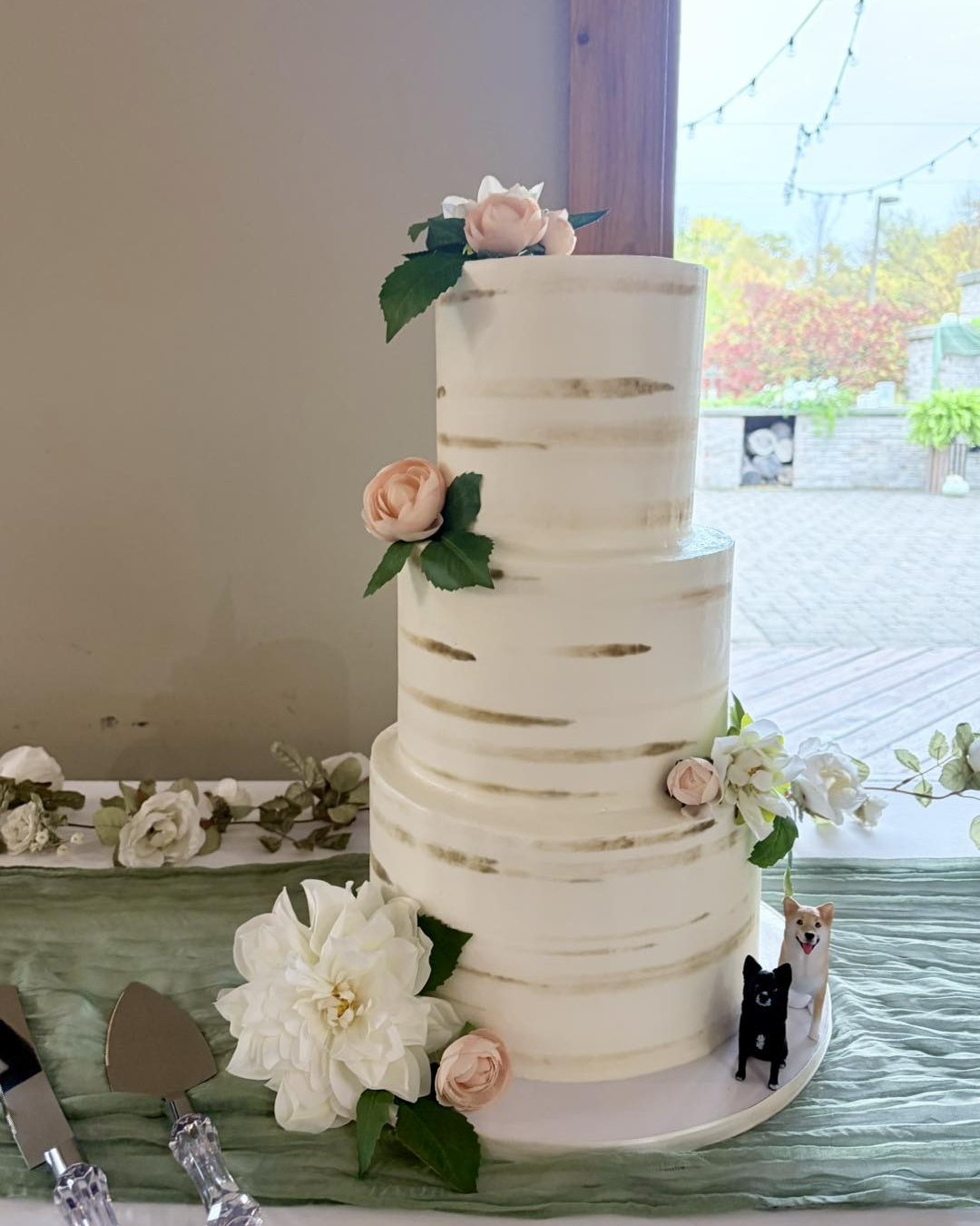 Tiered wedding cake with flowers
